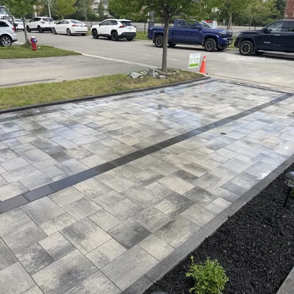Commercial interlocking driveway with charcoal border, Guelph landscaping by BCI Landscaping